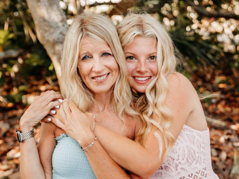 Stroke survivor Shelley Marshall (right) with her daughter, Kennley McCown. (Photo courtesy of Black Pineapple Photography)